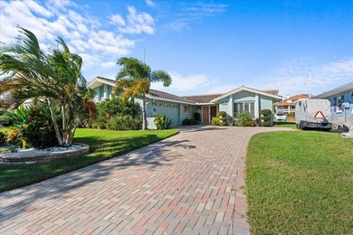 WATERFRONT SERENITY IN NEW PORT RICHEY - YOUR COASTAL ESCAPE on Gulf Harbors Golf Course in Florida - for sale on GolfHomes.com, golf home, golf lot