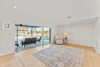 WATERFRONT SERENITY IN NEW PORT RICHEY - YOUR COASTAL ESCAPE on Gulf Harbors Golf Course in Florida - for sale on GolfHomes.com, golf home, golf lot