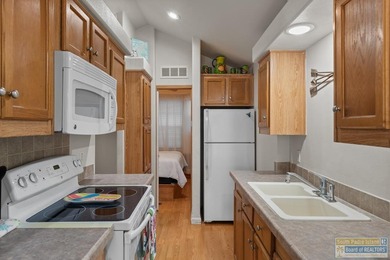 Charming and completely remodeled inside and out Park Model w/ on Long Island Golf Course in Texas - for sale on GolfHomes.com, golf home, golf lot