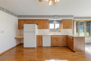 Picturesque views, wonderfully convenient, and plenty of space! on Brooktree Golf Course in Minnesota - for sale on GolfHomes.com, golf home, golf lot