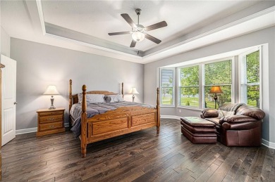 With gorgeous curb appeal and sweeping lake views from nearly on Falcon Lakes Golf Course in Kansas - for sale on GolfHomes.com, golf home, golf lot