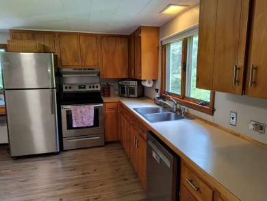 LOCATION!  Comfortable ranch style home in a private tree lined on Bretwood Golf Course in New Hampshire - for sale on GolfHomes.com, golf home, golf lot