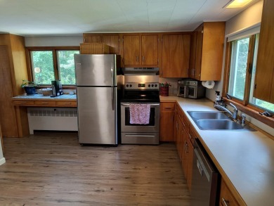 LOCATION!  Comfortable ranch style home in a private tree lined on Bretwood Golf Course in New Hampshire - for sale on GolfHomes.com, golf home, golf lot
