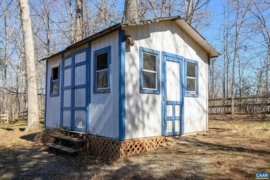 Nature-inspired charm meets effortless one-level living in on Lake Monticello Golf Course in Virginia - for sale on GolfHomes.com, golf home, golf lot