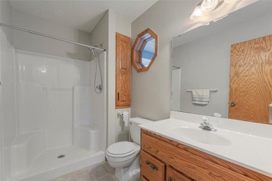 Picturesque views, wonderfully convenient, and plenty of space! on Brooktree Golf Course in Minnesota - for sale on GolfHomes.com, golf home, golf lot