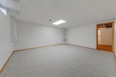 Picturesque views, wonderfully convenient, and plenty of space! on Brooktree Golf Course in Minnesota - for sale on GolfHomes.com, golf home, golf lot