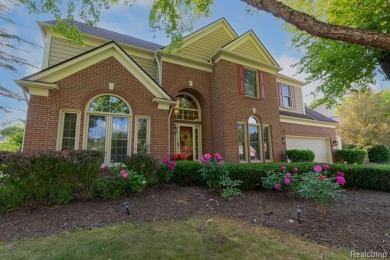 This gorgeous home, situated on the corner of an estate sized on Indianwood Golf and Country Club in Michigan - for sale on GolfHomes.com, golf home, golf lot