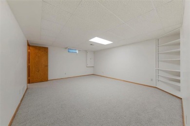 Picturesque views, wonderfully convenient, and plenty of space! on Brooktree Golf Course in Minnesota - for sale on GolfHomes.com, golf home, golf lot
