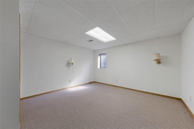 Picturesque views, wonderfully convenient, and plenty of space! on Brooktree Golf Course in Minnesota - for sale on GolfHomes.com, golf home, golf lot