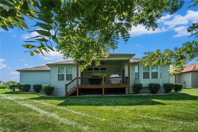 With gorgeous curb appeal and sweeping lake views from nearly on Falcon Lakes Golf Course in Kansas - for sale on GolfHomes.com, golf home, golf lot