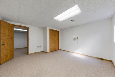 Picturesque views, wonderfully convenient, and plenty of space! on Brooktree Golf Course in Minnesota - for sale on GolfHomes.com, golf home, golf lot