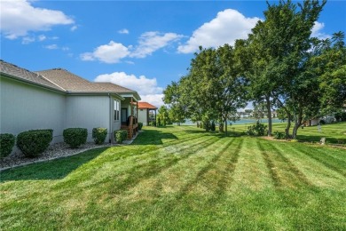 With gorgeous curb appeal and sweeping lake views from nearly on Falcon Lakes Golf Course in Kansas - for sale on GolfHomes.com, golf home, golf lot