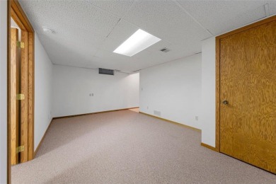 Picturesque views, wonderfully convenient, and plenty of space! on Brooktree Golf Course in Minnesota - for sale on GolfHomes.com, golf home, golf lot