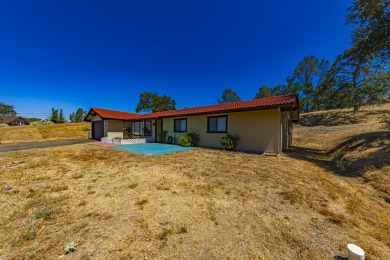 Move in ready home located in Yosemite Lakes Park with OWNED on Yosemite Lakes Park Golf Course in California - for sale on GolfHomes.com, golf home, golf lot