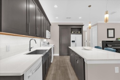 These luxury townhomes feature solid concrete block construction on Tuscawilla Country Club in Florida - for sale on GolfHomes.com, golf home, golf lot