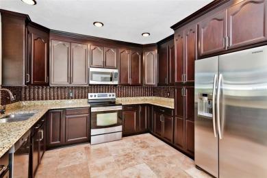 Welcome to this beautifully maintained 3-bedroom, 2.5-bath home on Arnold Palmers Bay Hill Club and Lodge  in Florida - for sale on GolfHomes.com, golf home, golf lot