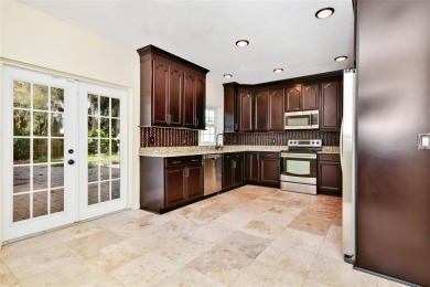 Welcome to this beautifully maintained 3-bedroom, 2.5-bath home on Arnold Palmers Bay Hill Club and Lodge  in Florida - for sale on GolfHomes.com, golf home, golf lot