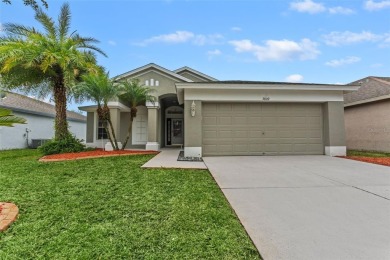 Welcome to 5809 War Admiral Drive, nestled in the highly on Lexington Oaks Golf Club in Florida - for sale on GolfHomes.com, golf home, golf lot