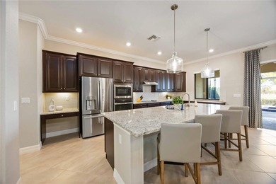 Welcome to 25064 Spartina Drive, an executive home that is on Sarasota National Golf Club in Florida - for sale on GolfHomes.com, golf home, golf lot