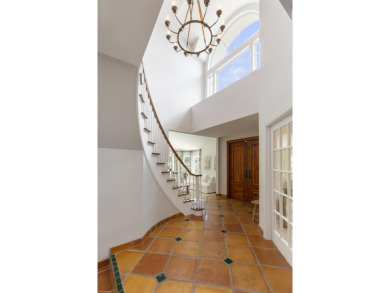 Discover the epitome of luxury living in this beautifully on Palm Beach Polo and Country Club in Florida - for sale on GolfHomes.com, golf home, golf lot