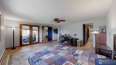 This charming home offers nearly 2,100 finished sq ft with two on Cattail Creek Golf Course in Colorado - for sale on GolfHomes.com, golf home, golf lot