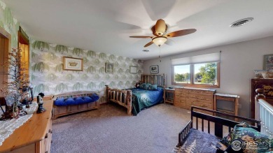 This charming home offers nearly 2,100 finished sq ft with two on Cattail Creek Golf Course in Colorado - for sale on GolfHomes.com, golf home, golf lot