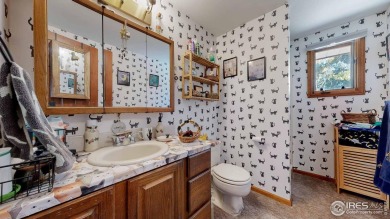 This charming home offers nearly 2,100 finished sq ft with two on Cattail Creek Golf Course in Colorado - for sale on GolfHomes.com, golf home, golf lot