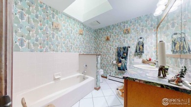 This charming home offers nearly 2,100 finished sq ft with two on Cattail Creek Golf Course in Colorado - for sale on GolfHomes.com, golf home, golf lot