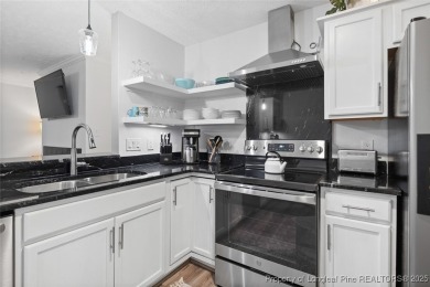 Beautiful updated condo at King's Grant Condominium; located in on Kings Grant Golf and Country Club in North Carolina - for sale on GolfHomes.com, golf home, golf lot