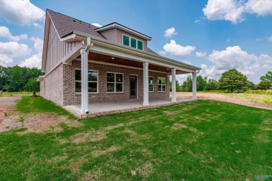 Overlooking the 17th hole of Southern Gayles Golf Course, this on Southern Gayles Golf Community in Alabama - for sale on GolfHomes.com, golf home, golf lot