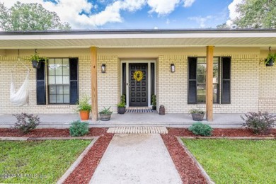 This charming white brick home has 4 bedrooms and 3 baths on Starke Golf and Country Club in Florida - for sale on GolfHomes.com, golf home, golf lot