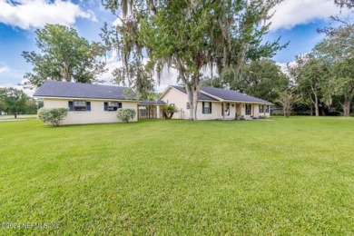 This charming white brick home has 4 bedrooms and 3 baths on Starke Golf and Country Club in Florida - for sale on GolfHomes.com, golf home, golf lot