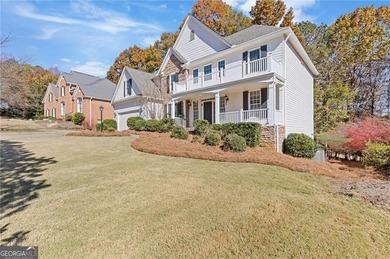 Beautiful traditional-style home with a rocking chair front on Canongate At Olde Atlanta Golf Club in Georgia - for sale on GolfHomes.com, golf home, golf lot