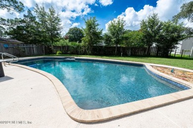 This charming white brick home has 4 bedrooms and 3 baths on Starke Golf and Country Club in Florida - for sale on GolfHomes.com, golf home, golf lot