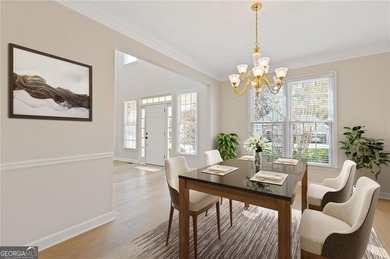 Beautiful traditional-style home with a rocking chair front on Canongate At Olde Atlanta Golf Club in Georgia - for sale on GolfHomes.com, golf home, golf lot