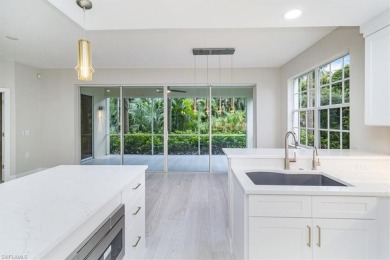 Welcome to this stunning first-floor carriage home, where on West Bay Beach and Golf Club in Florida - for sale on GolfHomes.com, golf home, golf lot