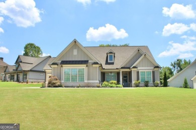 5 bedroom 3 1/2 bathroom immaculate 1 1/2 story in sought after on Traditions of Braselton Golf Club in Georgia - for sale on GolfHomes.com, golf home, golf lot