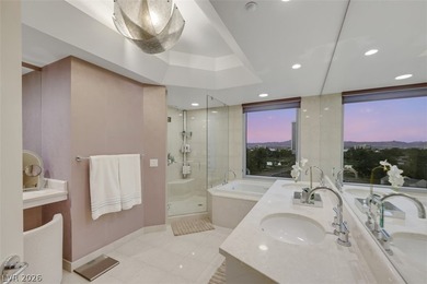 Stunning corner residence with dramatic curved floor-to-ceiling on  in Nevada - for sale on GolfHomes.com, golf home, golf lot