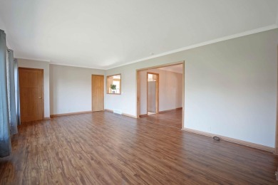This charming ranch home offers more than meets the eye! With on Irv Warren Memorial Golf Course in Iowa - for sale on GolfHomes.com, golf home, golf lot