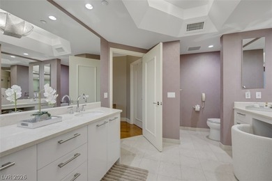 Stunning corner residence with dramatic curved floor-to-ceiling on  in Nevada - for sale on GolfHomes.com, golf home, golf lot