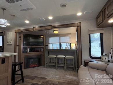 Resort living made easy-just bring your suitcase and start on Old North State Club at Uwharrie Point Golf community in North Carolina - for sale on GolfHomes.com, golf home, golf lot