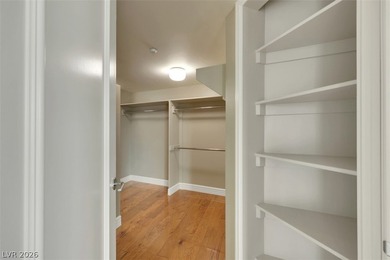 Stunning corner residence with dramatic curved floor-to-ceiling on  in Nevada - for sale on GolfHomes.com, golf home, golf lot