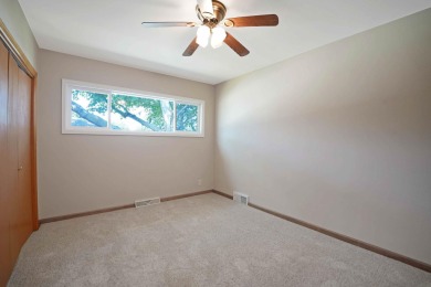 This charming ranch home offers more than meets the eye! With on Irv Warren Memorial Golf Course in Iowa - for sale on GolfHomes.com, golf home, golf lot