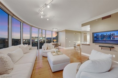 Stunning corner residence with dramatic curved floor-to-ceiling on  in Nevada - for sale on GolfHomes.com, golf home, golf lot