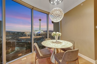 Stunning corner residence with dramatic curved floor-to-ceiling on  in Nevada - for sale on GolfHomes.com, golf home, golf lot