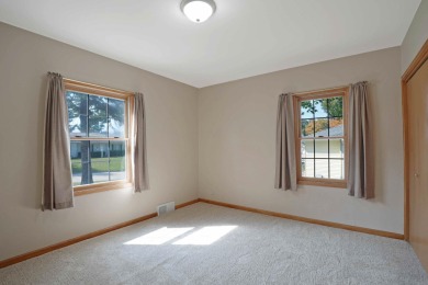 This charming ranch home offers more than meets the eye! With on Irv Warren Memorial Golf Course in Iowa - for sale on GolfHomes.com, golf home, golf lot