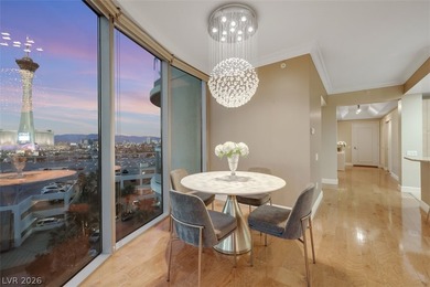 Stunning corner residence with dramatic curved floor-to-ceiling on  in Nevada - for sale on GolfHomes.com, golf home, golf lot