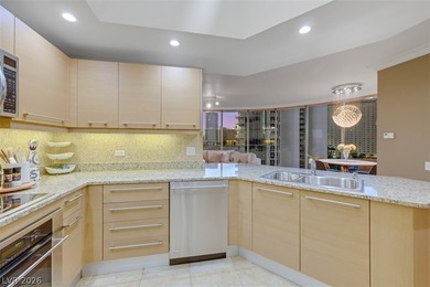 Stunning corner residence with dramatic curved floor-to-ceiling on  in Nevada - for sale on GolfHomes.com, golf home, golf lot