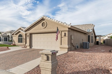 This immaculate, well-maintained home is nestled in a quiet on Tuscany Falls At Pebble Creek in Arizona - for sale on GolfHomes.com, golf home, golf lot