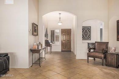 This immaculate, well-maintained home is nestled in a quiet on Tuscany Falls At Pebble Creek in Arizona - for sale on GolfHomes.com, golf home, golf lot